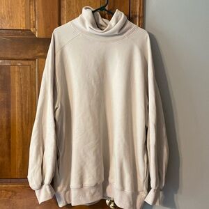 Lit oversize, hooded turtleneck sweatshirt